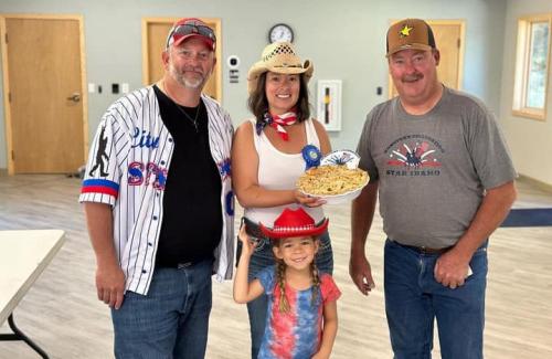 2024 pie contest winner with mayor and councilman