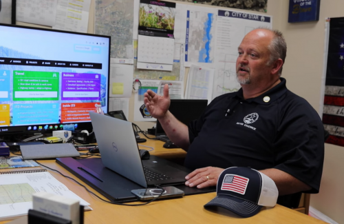 mayor sitting at his desk and talking