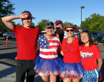 picture of three runners in patriotic clothing