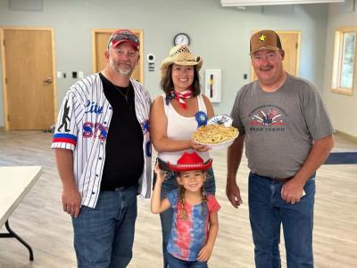 2024 pie contest winner with mayor and councilman